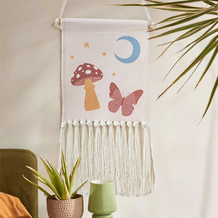 Woven wall hanging with hand-knotted fringes and bunny motif