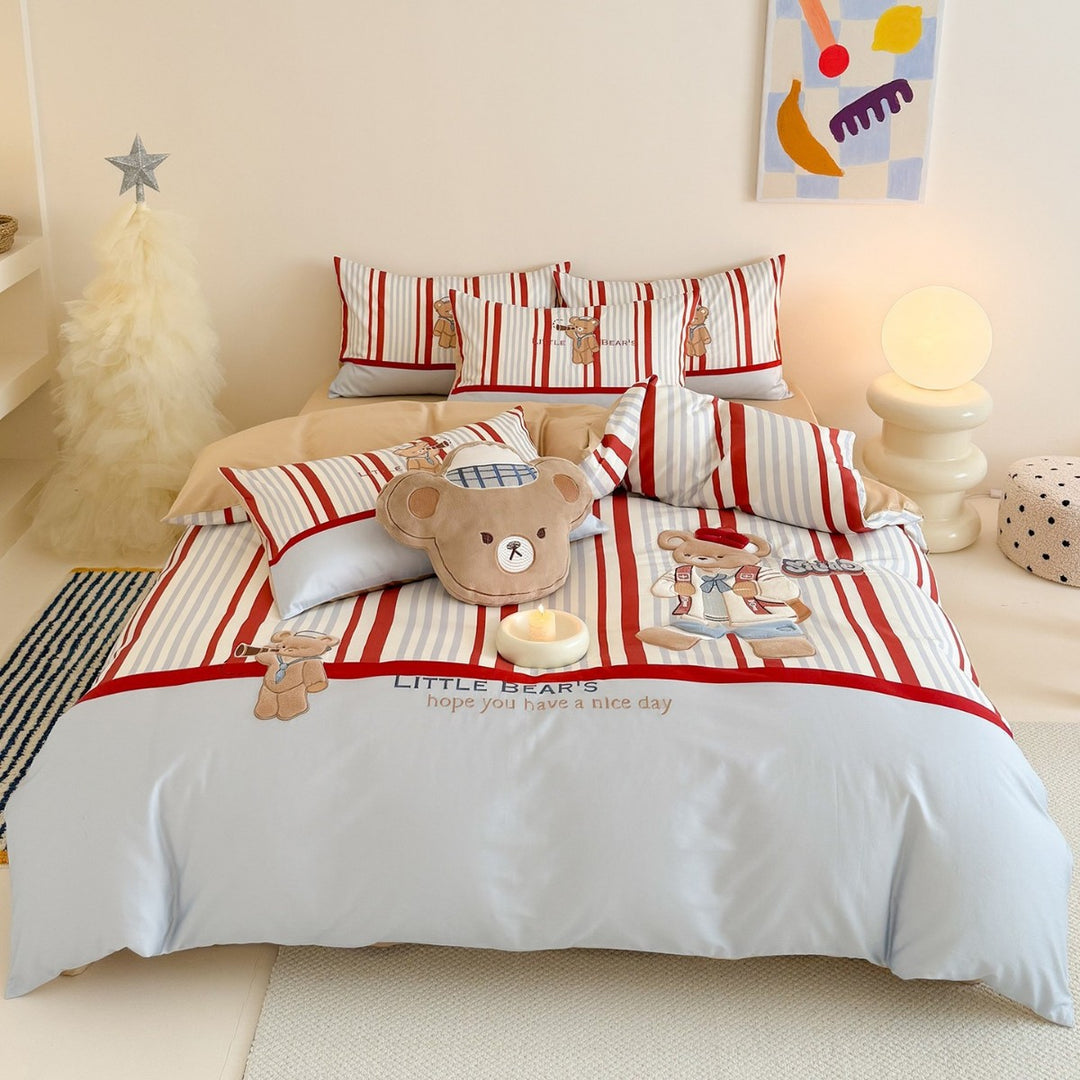 Children's bedding set with embroidered teddy bear design and fine stripes