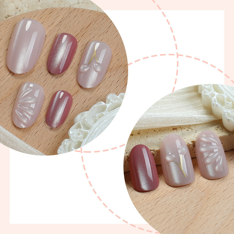 Acrylic nail set with elegant high-gloss finish and creative embellishments Stornfield