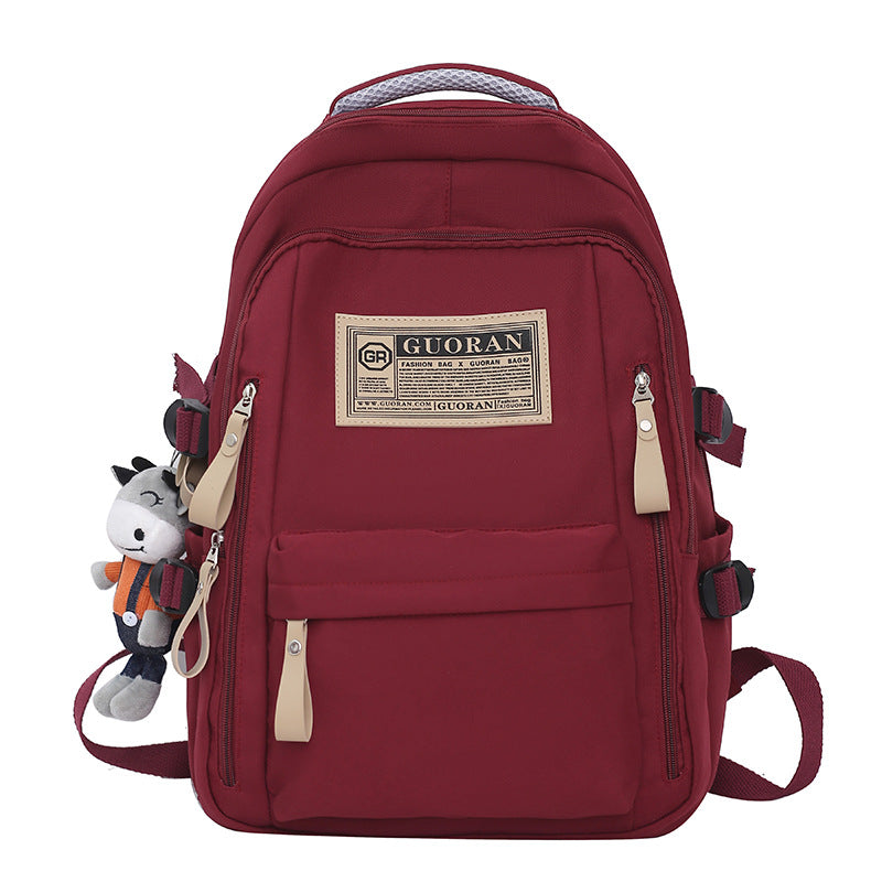Versatile Casual Backpack with Plush Keychain