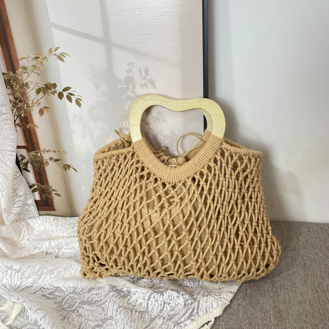 Stylish handbag with heart-shaped handle Stornfield