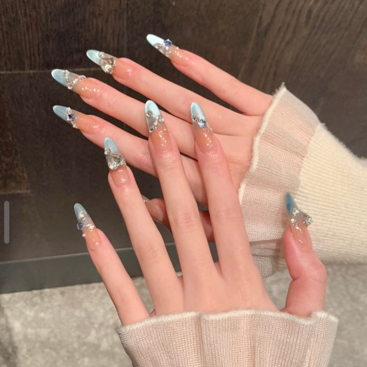 Artifical nails with shiny rhinestone decorations Stornfield