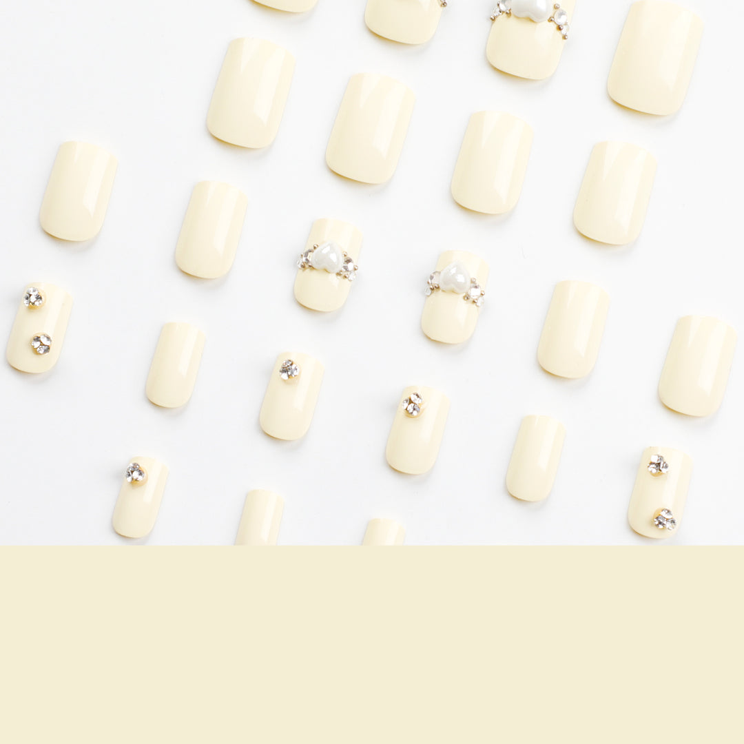 Artistic Nail Extensions with Elegant Decorative Details Stornfield