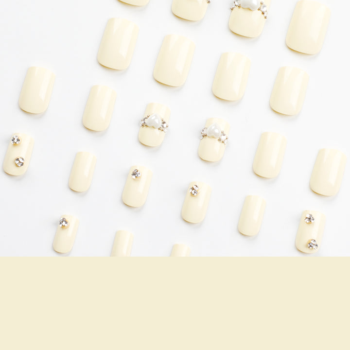 Artistic Nail Extensions with Elegant Decorative Details Stornfield