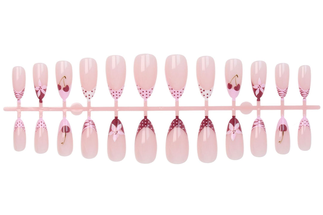 Nail art set with creative flower, heart and polka dot designs Stornfield