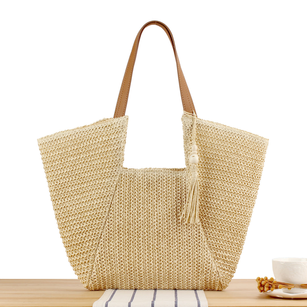 Beach bag made of natural weave with elegant leather accents Stornfield