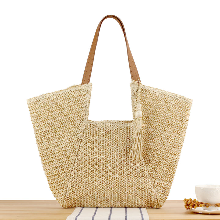 Beach bag made of natural weave with elegant leather accents Stornfield