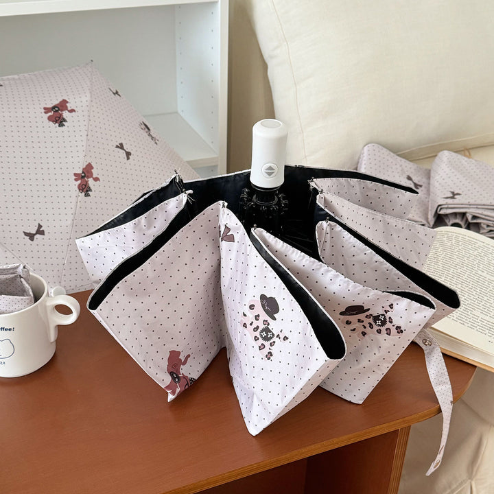 Ladies collapsible umbrella with playful design Stornfield