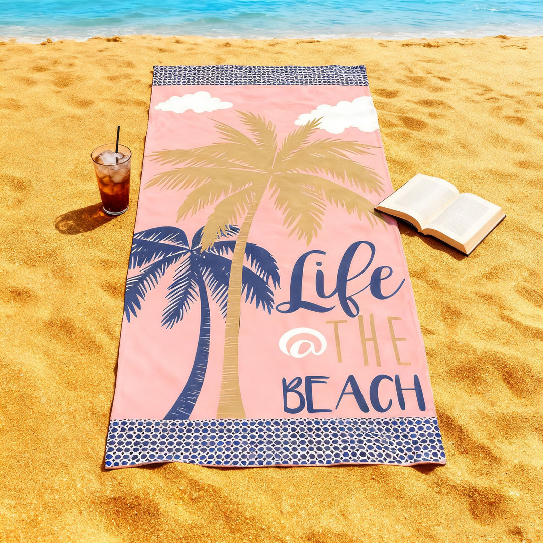 Beach towel with tropical palm leaf pattern Stornfield