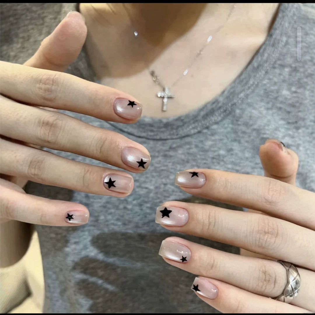 Artistic Press-On Nail Set with Star Designs Stornfield