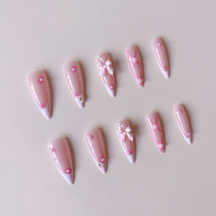 False nail set with playful 3D details and elegant accents Stornfield