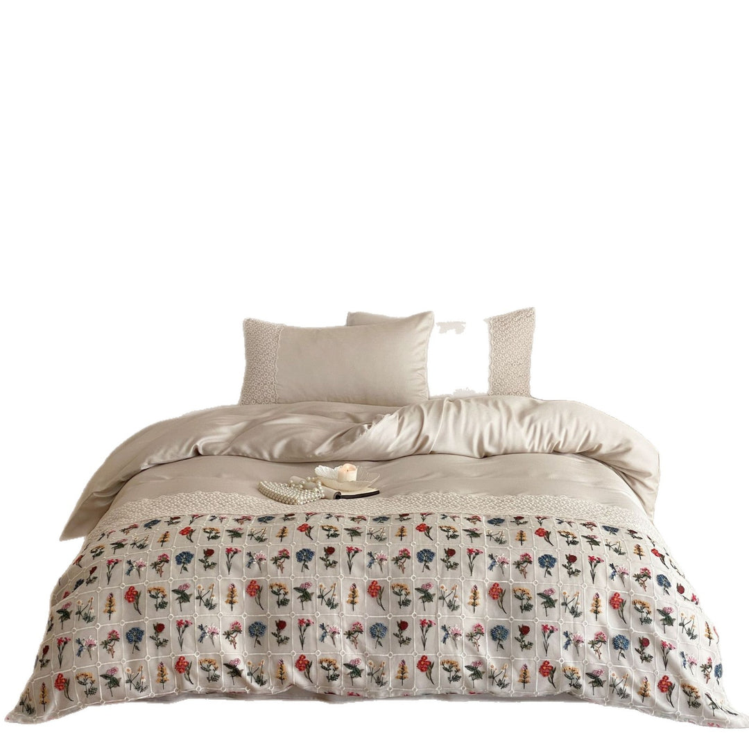 Embroidered duvet and bedspread with floral patchwork embroidery