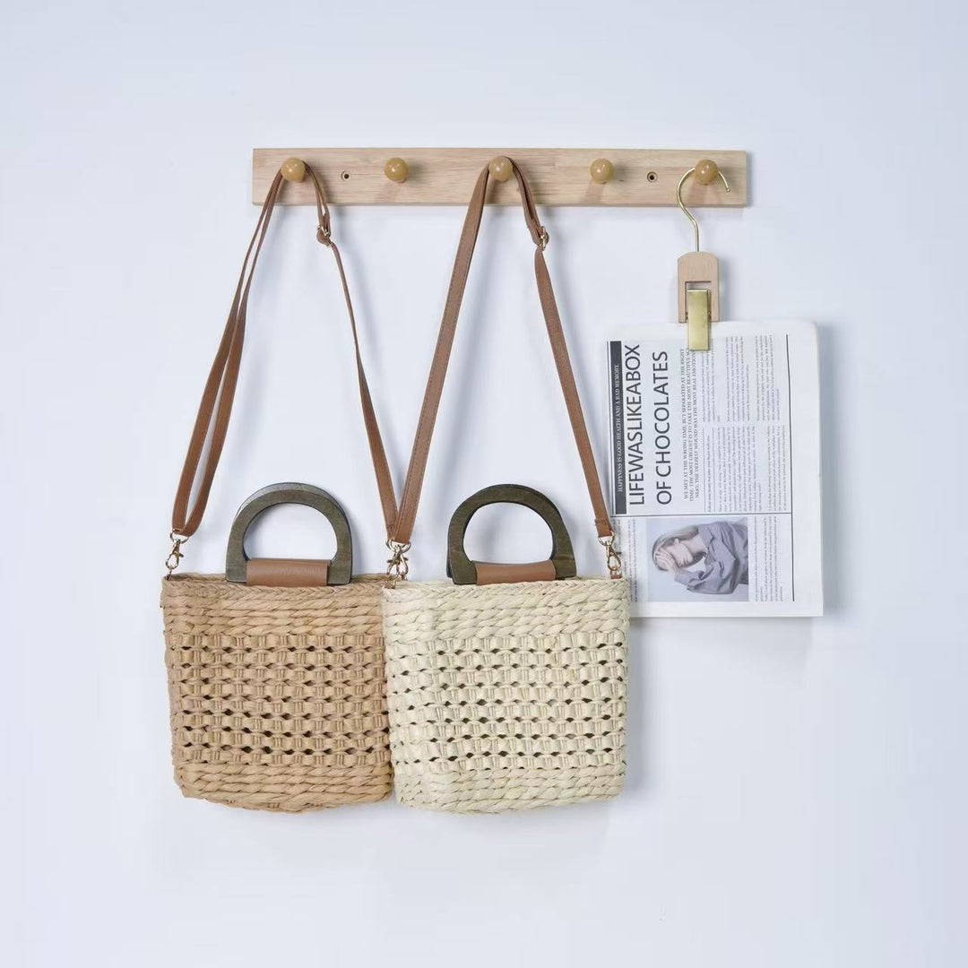 Woven natural material handbag with comfortable shoulder carrying device Stornfield