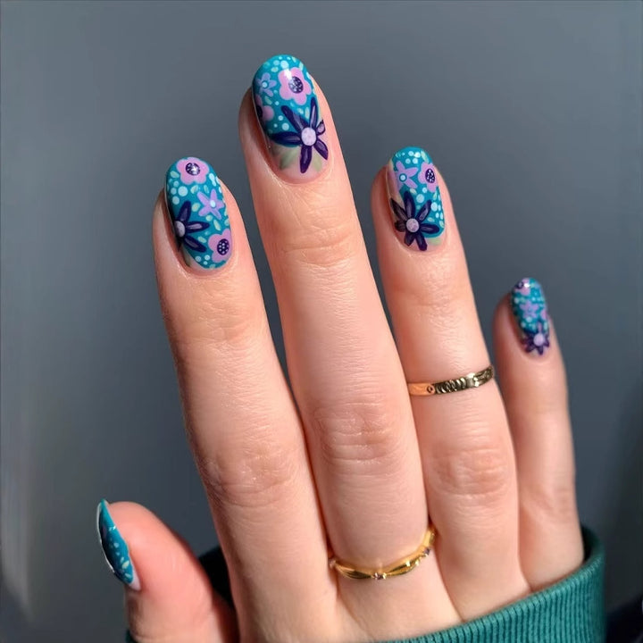 Nail art set with floral accents and vibrant patterns Stornfield