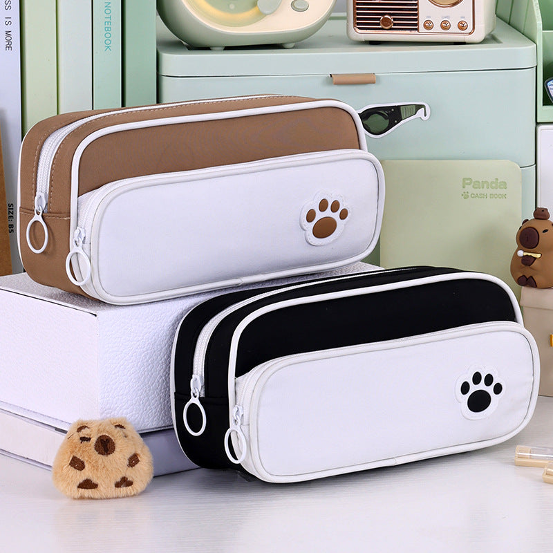 Pencil case with double compartment design and playful paw print motif Stornfield