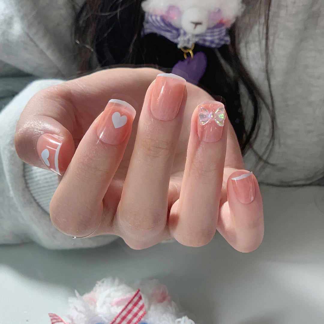 Artful nail extensions with an elegant leaf pattern Stornfield