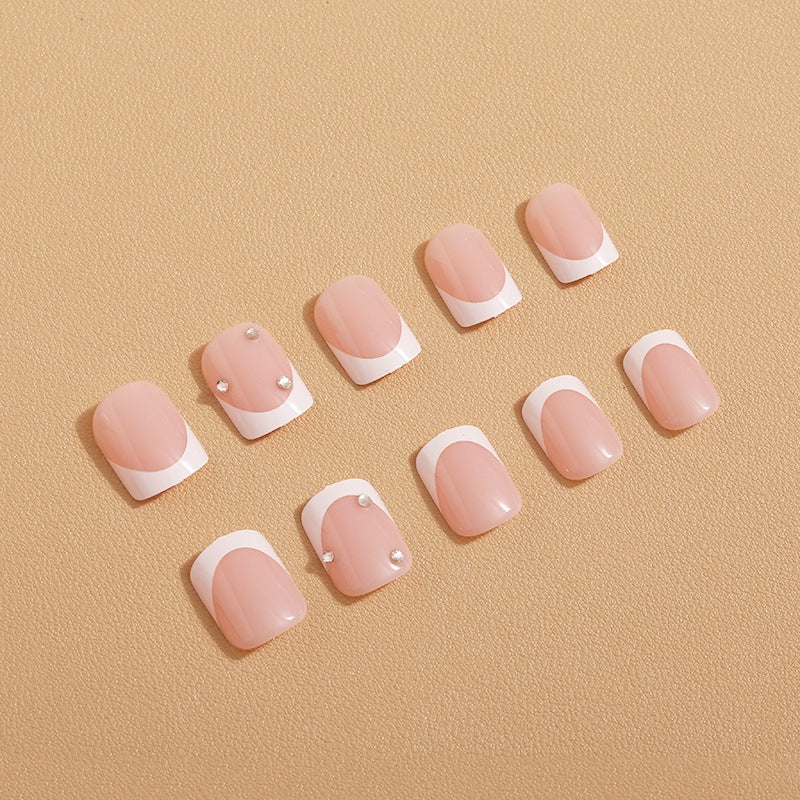 Artificial nails with elegant butterfly embellishments Stornfield