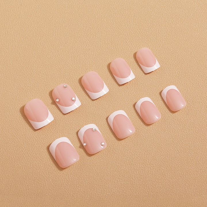 Artificial nails with elegant butterfly embellishments Stornfield
