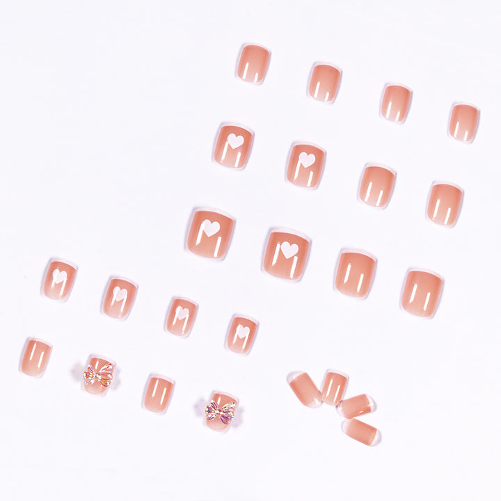 Nail art with heart and butterfly motifs Stornfield