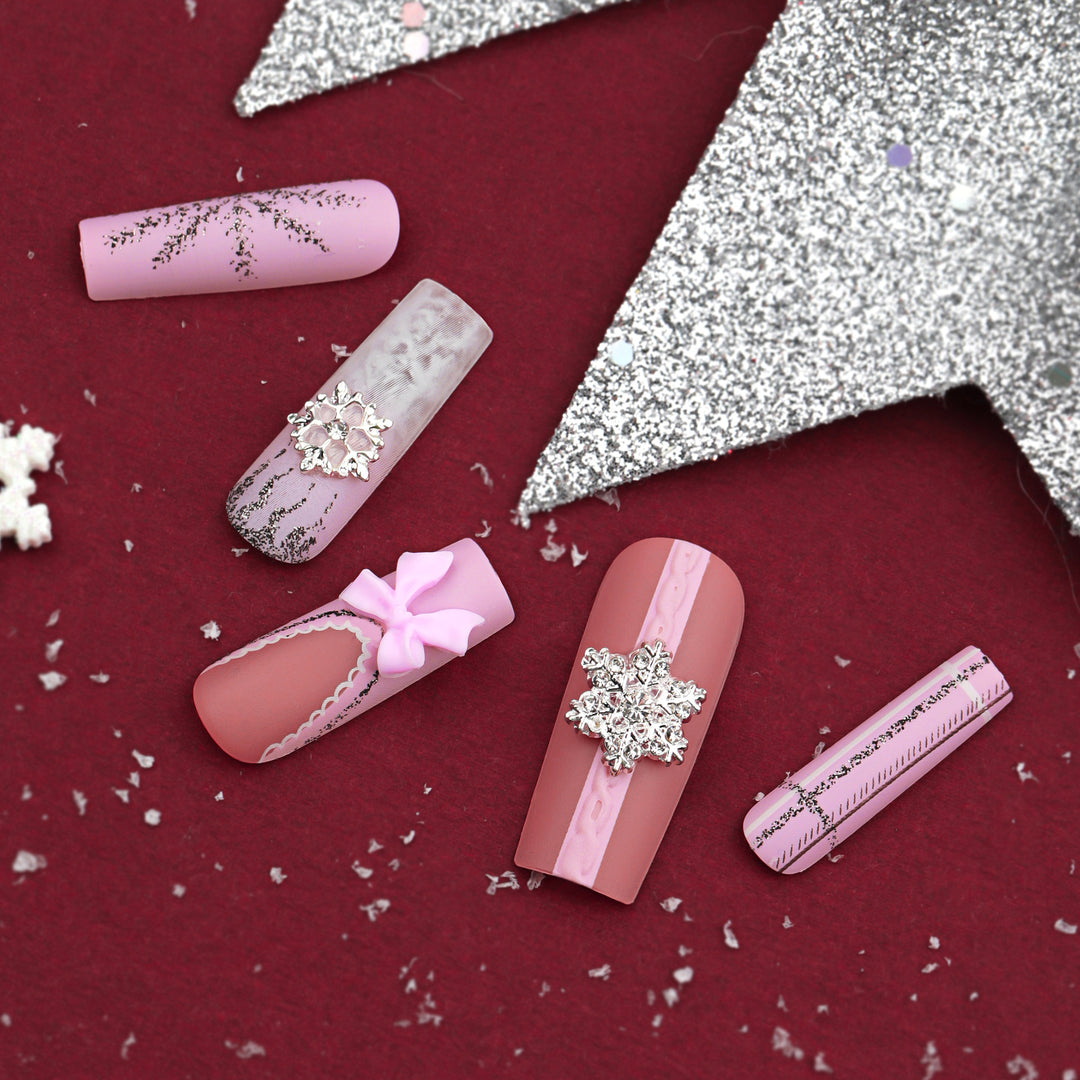 Artful nail extensions with festive decorations Stornfield