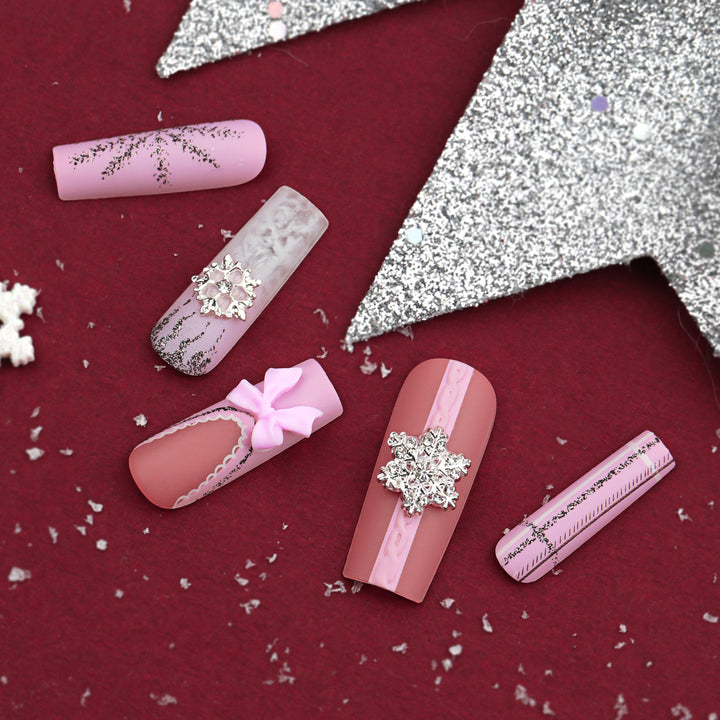 Artful nail extensions with festive decorations Stornfield