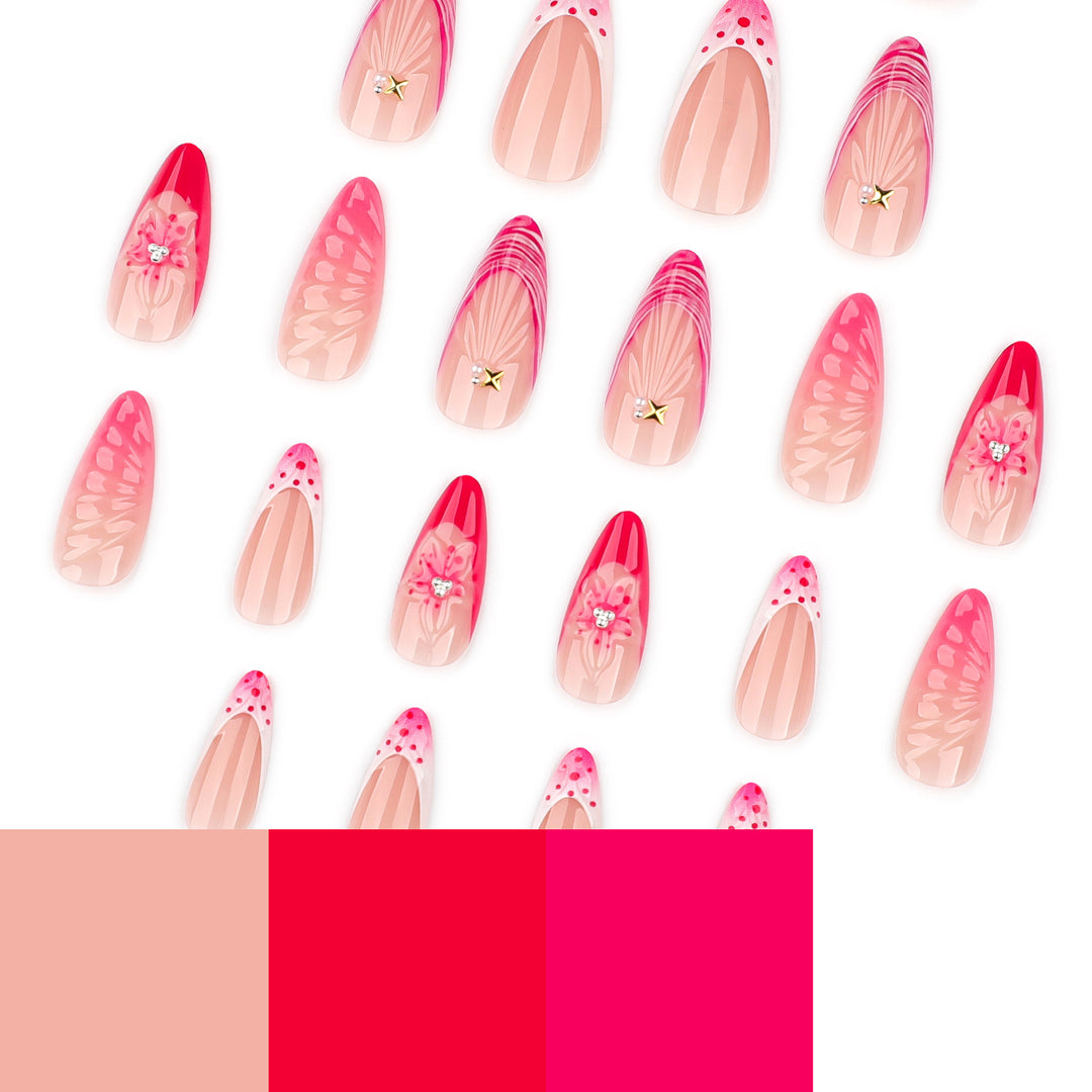 Artful stiletto nails with floral design and glitter accents Stornfield