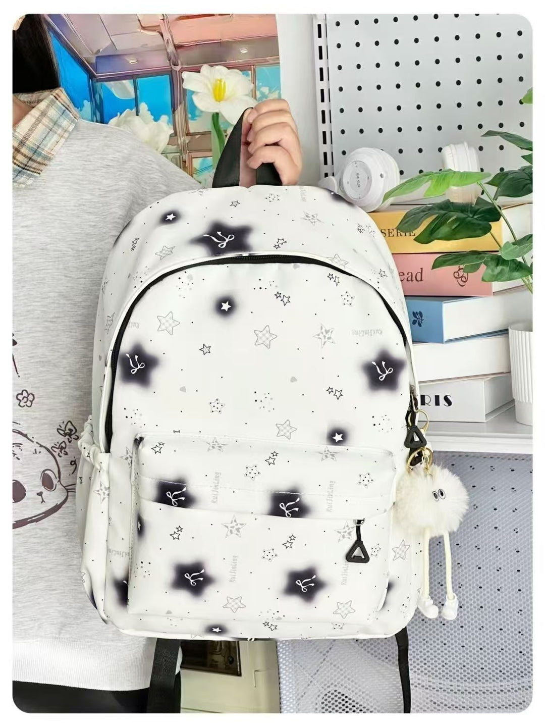 School backpack with playful star design and multiple compartments Stornfield