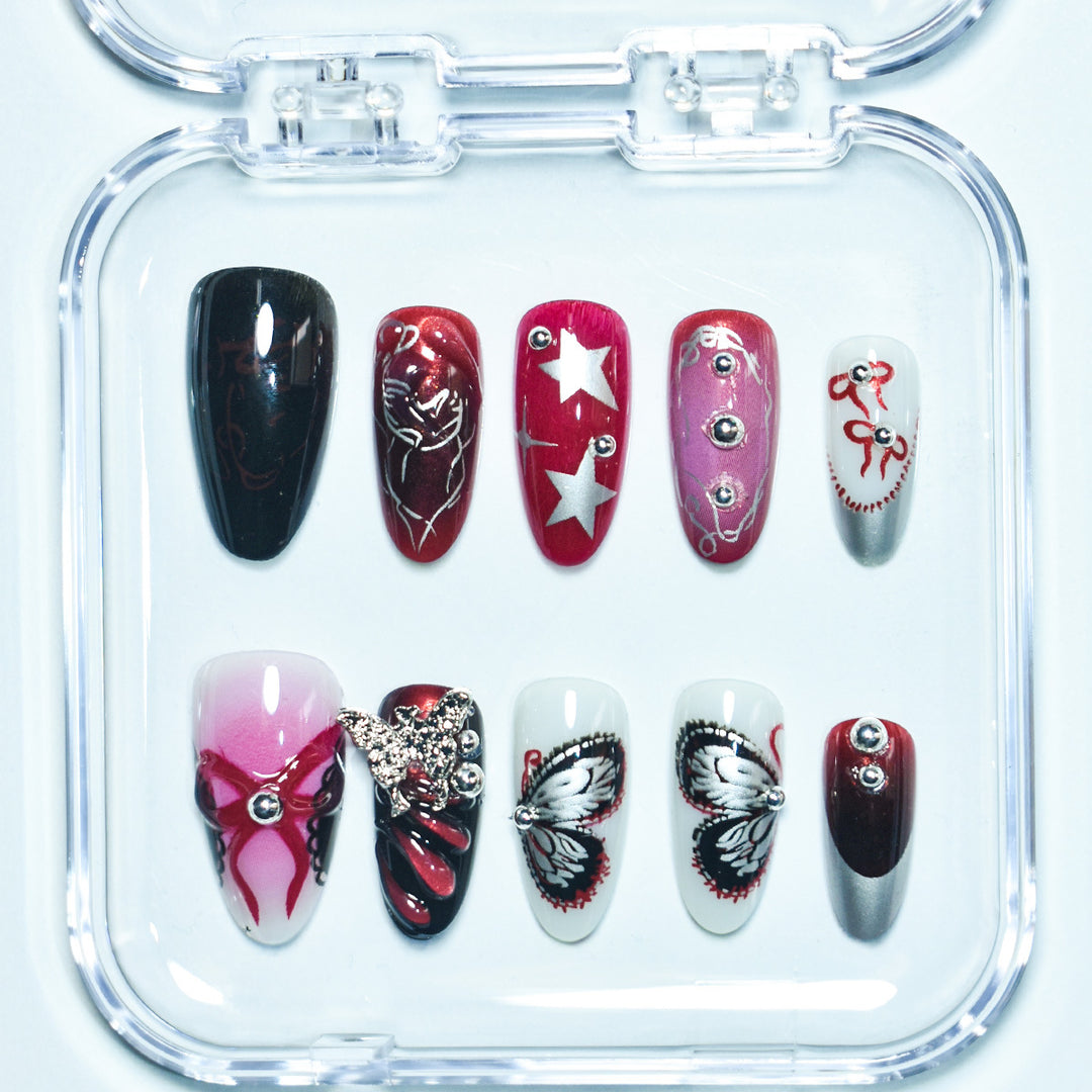 Artistic Press-On Nail Set with Butterfly and Star Details Stornfield