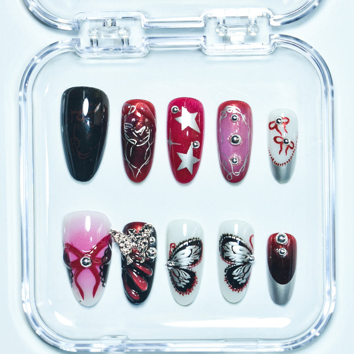 Artistic Press-On Nail Set with Butterfly and Star Details Stornfield
