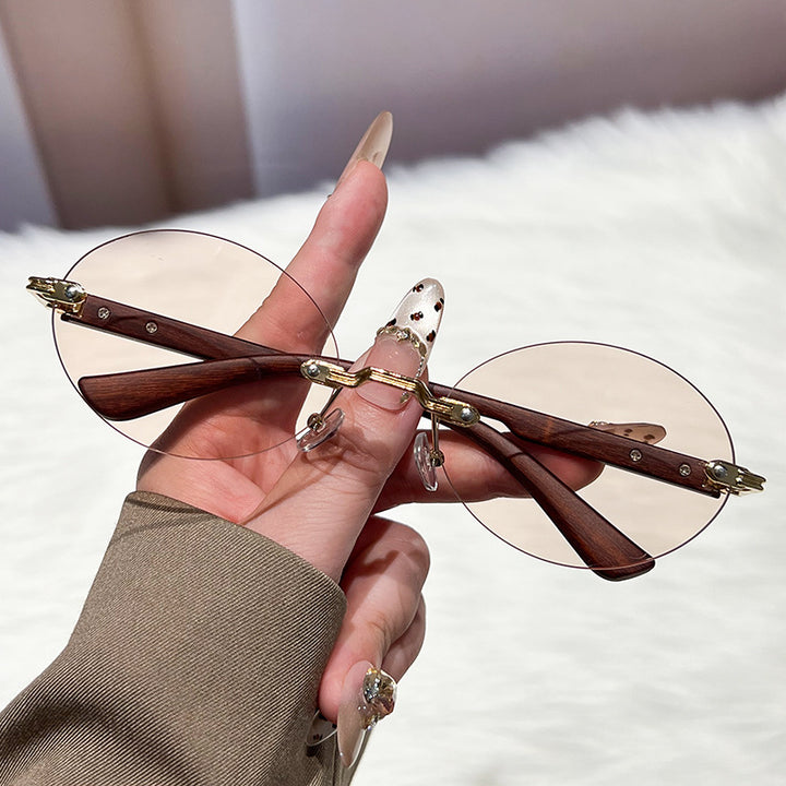 Ladies fashionable and elegant sunglasses with oval design Stornfield