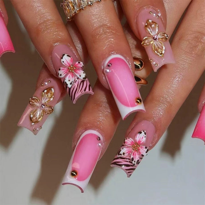 Artificial nail set with floral and glamorous decorations Stornfield