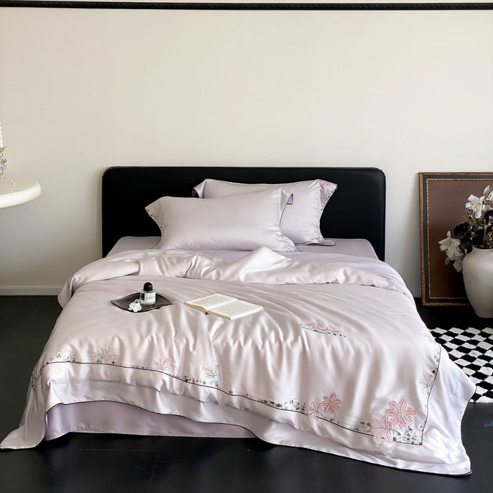 Luxurious silk bedding set with embroidered floral design