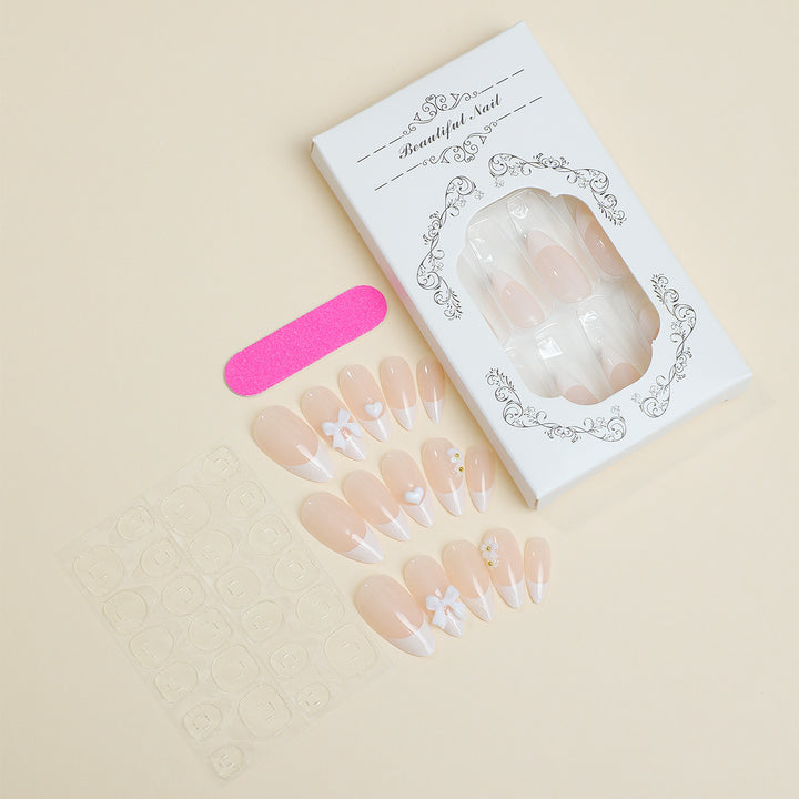 Artificial nail set with decorative French tip design Stornfield