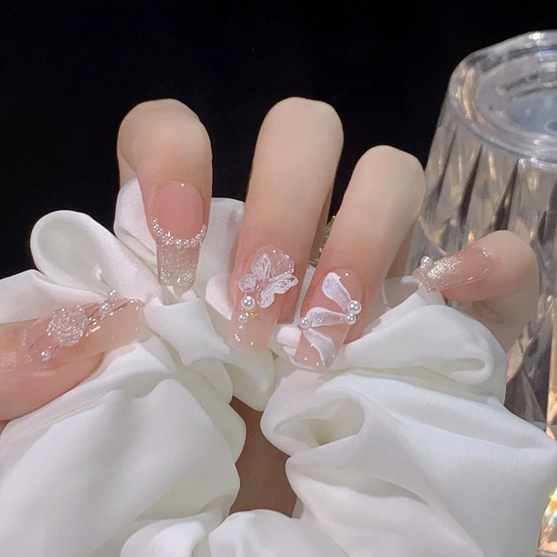 Artistic Press-On Nail Set with Elegant Floral and Butterfly Designs Stornfield