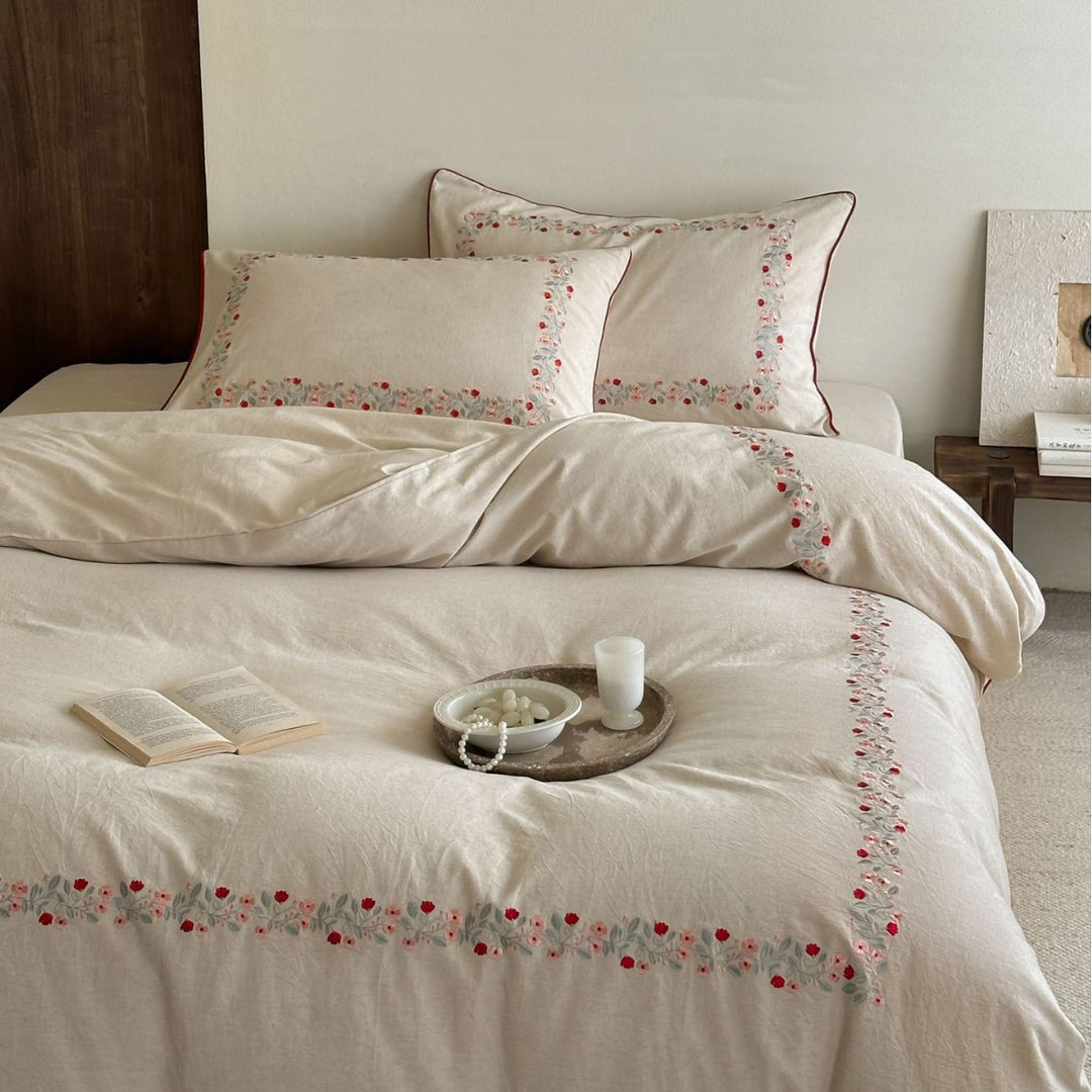 Linen bedding set with floral embroidery border