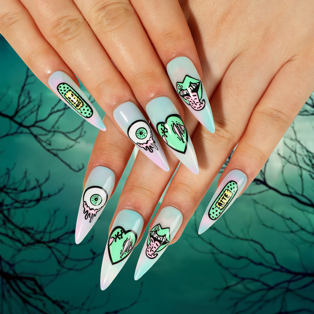 Artistic stiletto nails with creative designs and intricate detailing Stornfield