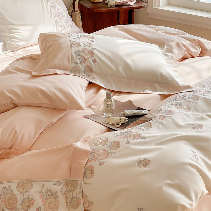 Premium bedding set made of cotton satin with floral border embroidery and reversible function