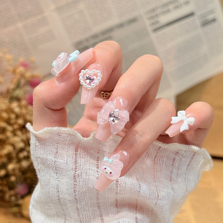 Elegant Stiletto Press-On Nails with Floral and Glitter Accents Stornfield