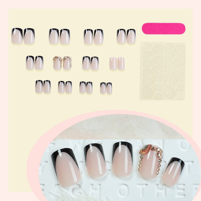 Nail set with an elegant gradient and glitter accents Stornfield