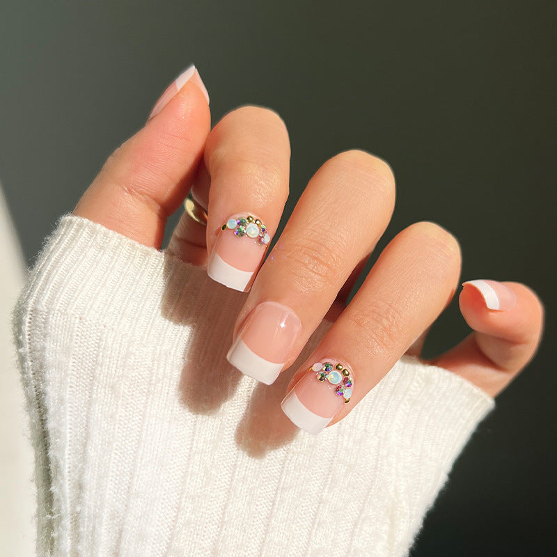 Artful Nail Extensions with Elegant Jewelry Accents Stornfield