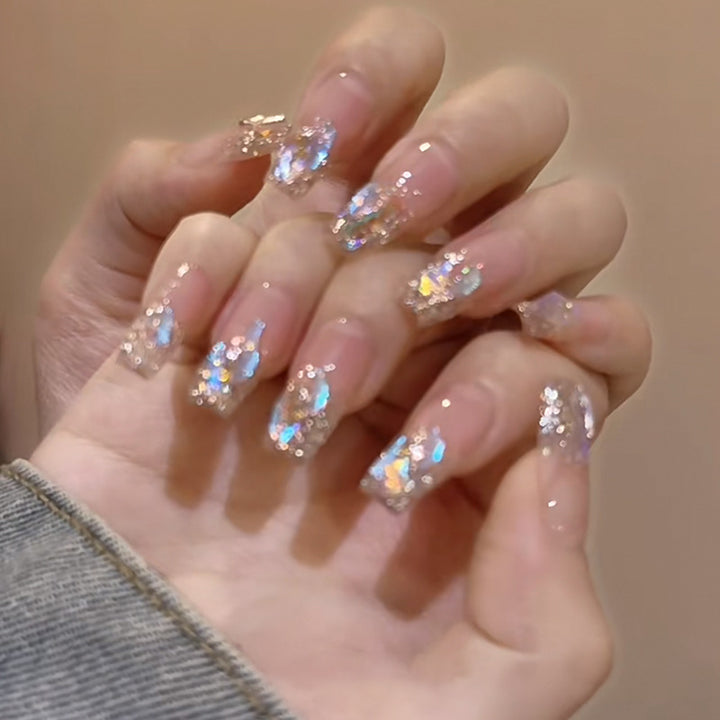 Glamorous nail art with holographic accents Stornfield