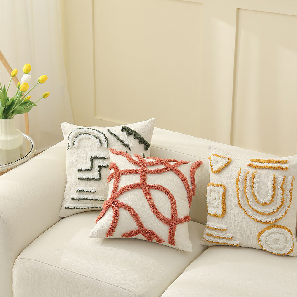 Geometric tufted sofa cushion with textured loop appliqué and removable cover Stornfield