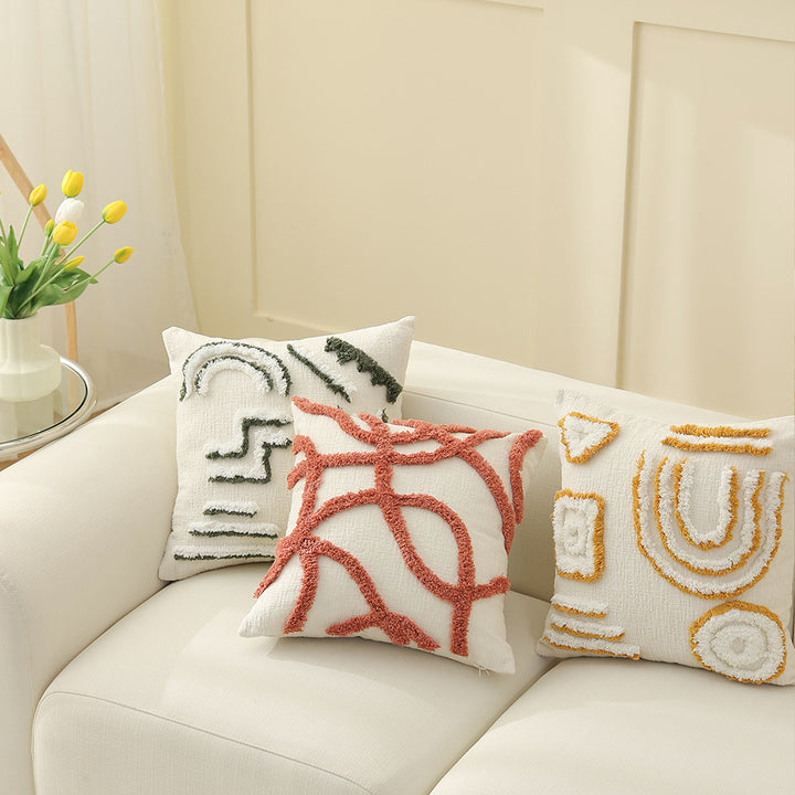 Geometric tufted sofa cushion with textured loop appliqué and removable cover Stornfield