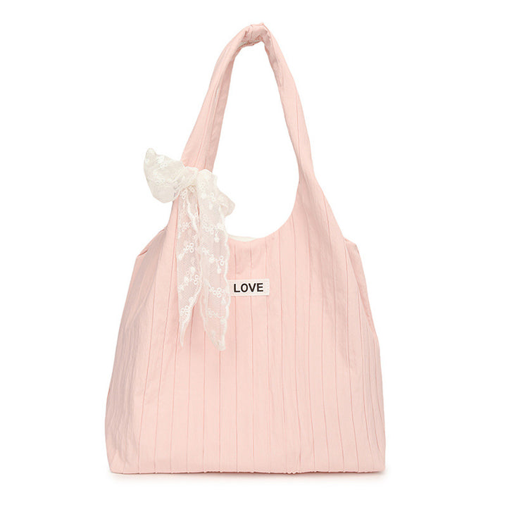 Leisure bag with structured design and playful scarf Stornfield