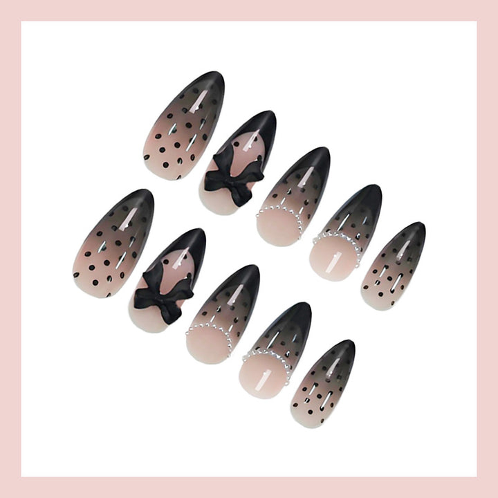 Nail art set with elegant dot and bow pattern Stornfield