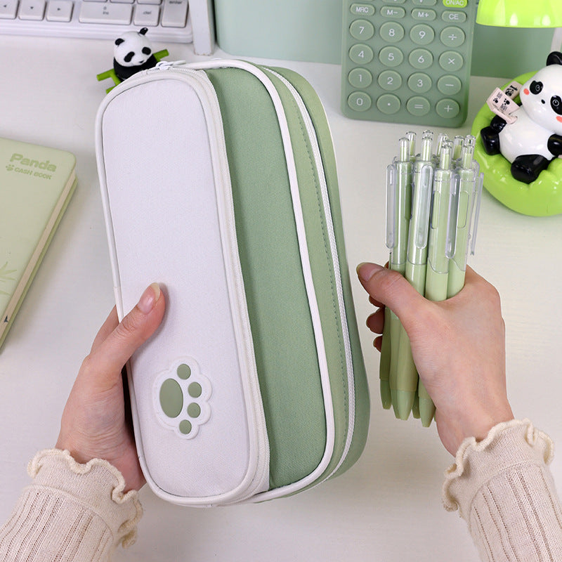 Pencil case with double compartment design and playful paw print motif Stornfield