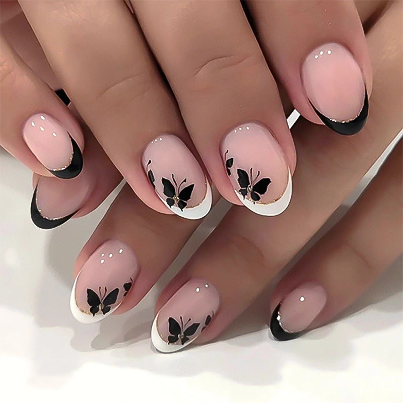Elegantly designed nail art with butterfly motif Stornfield