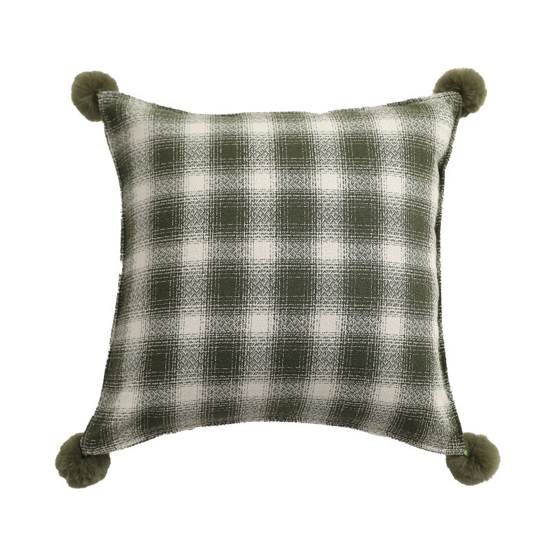 Square living decorative pillow with woven check structure and pom-pom corners