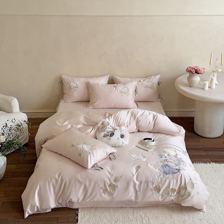 Exclusive satin bed linen set with detailed embroidery of cats and moon motif