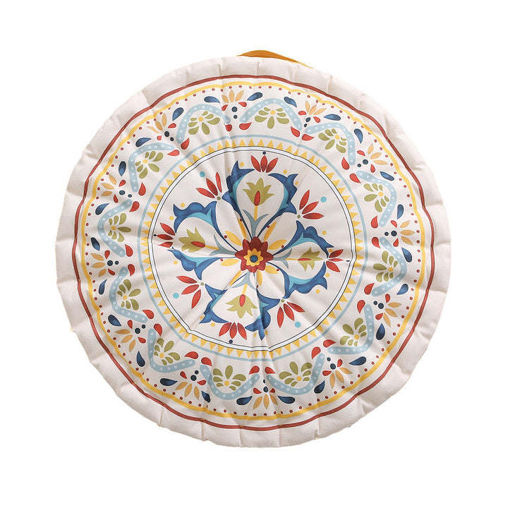 Round floor cushion with medal print, carrying handle and quilted padding